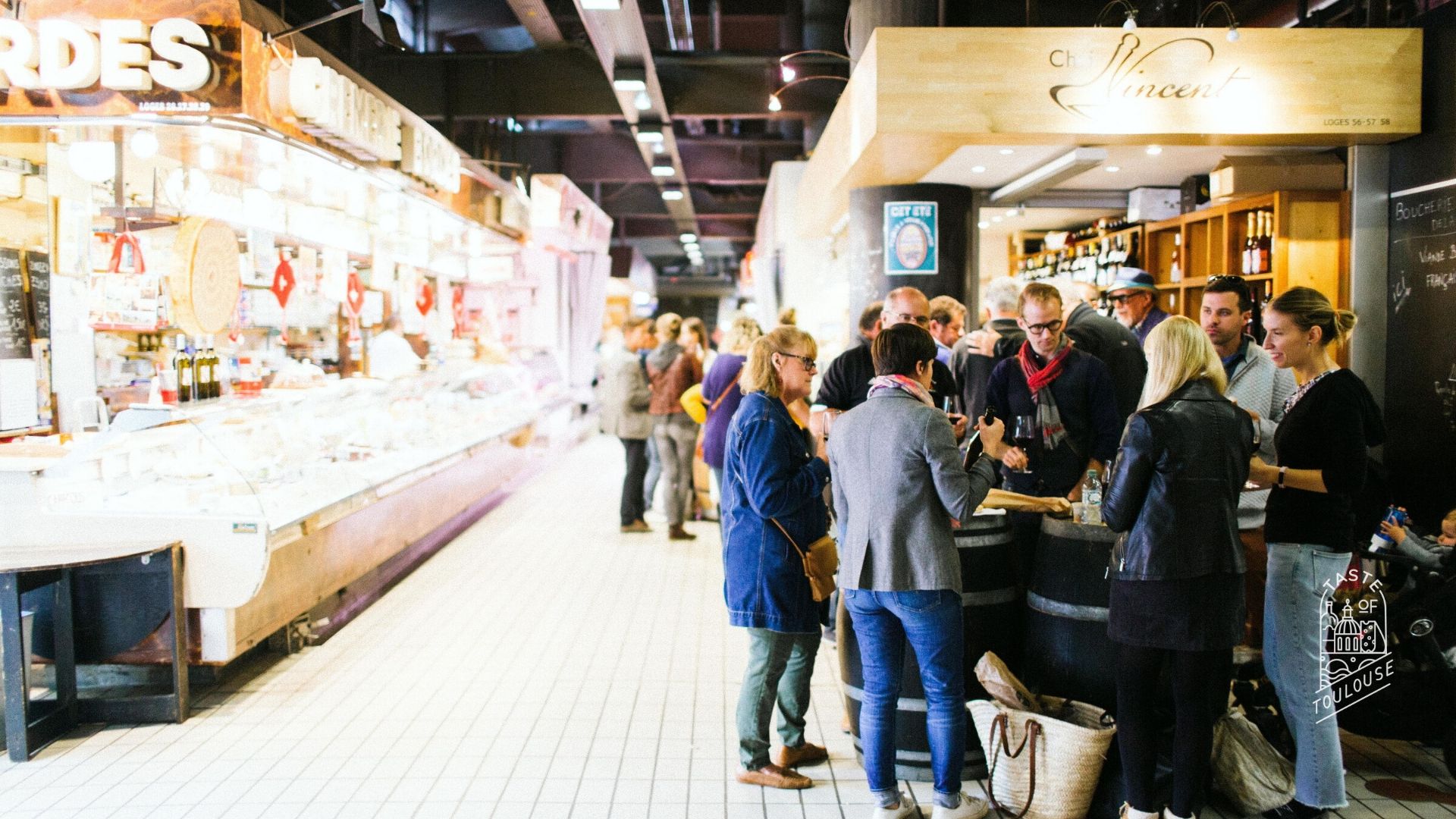 Market tour and wine tasting at the Marché Victor Hugo. Taste of Toulouse Zoom virtual background.