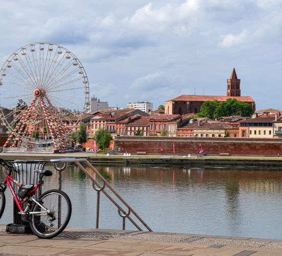 Ferris wheel beside the river in Toulouse
