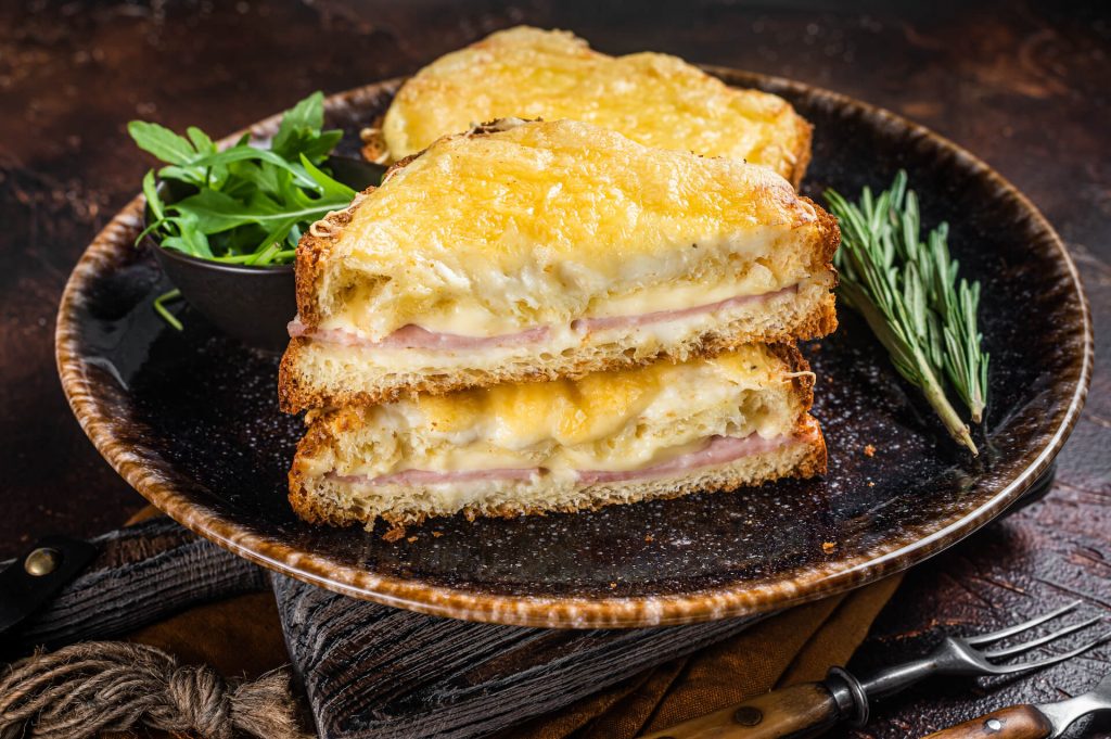 Croque Monsieur toasted sandwich with Cheese, Ham, Gruyere and Bechamel Sauce
